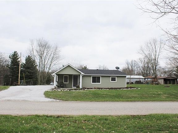 The home has a huge gravel driveway for plenty of parking. A big yard for the kids to play and a fire pit for entertaining.