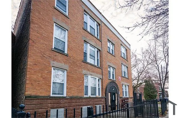Building Photo - 6055 S Peoria St #3