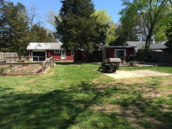 From back yard showing garden, before new roof