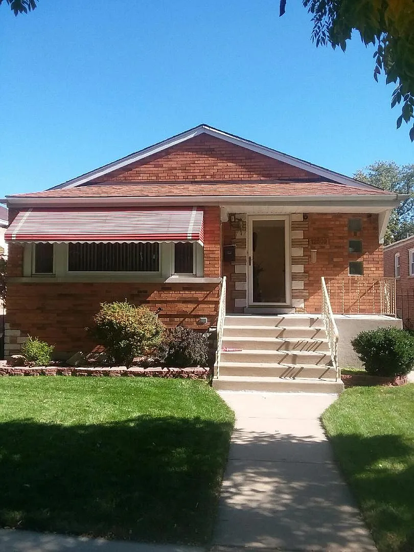 12509 S Eggleston Ave photo 1