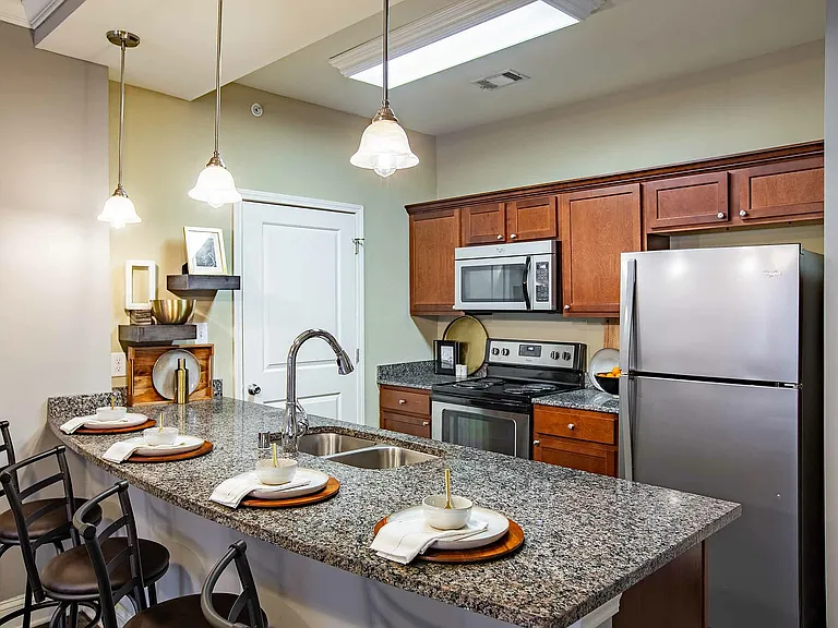 Experience the elegance of a modern kitchen designed for both style and functionality.