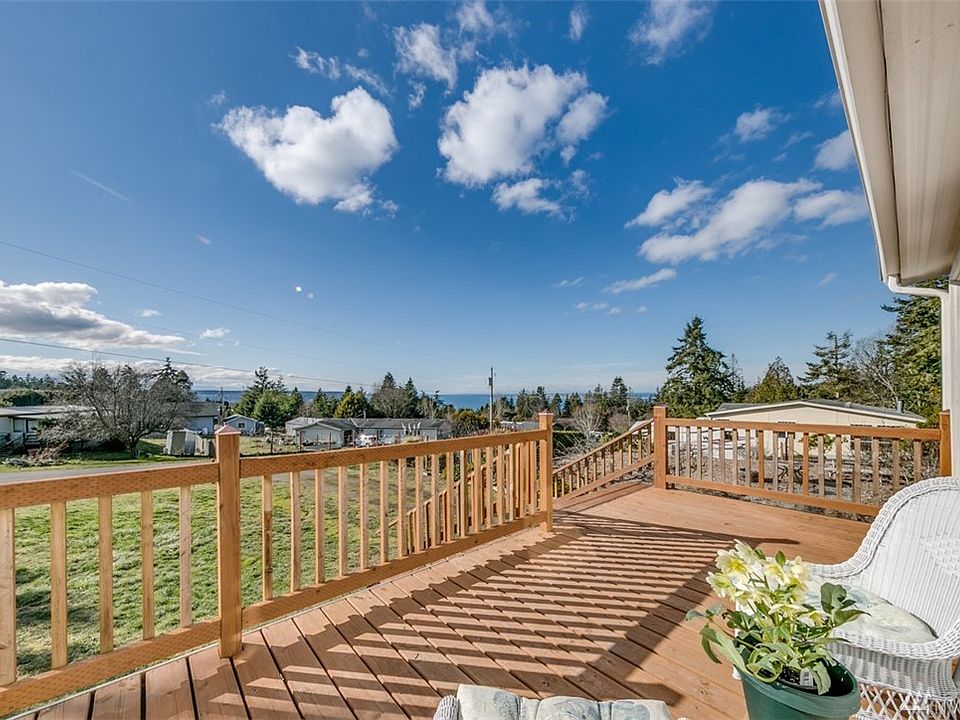 The home is oriented to capture the water and mountain view from the front deck and all front room windows.  