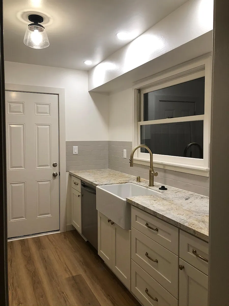 renovated kitchen, ceramic cast iron sink, open shelving not pictured - 4430 Orinda Way