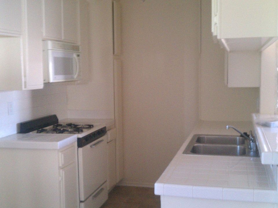 2nd image of 9715 Charnock Ave #107