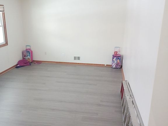 Large living room space with new LVP