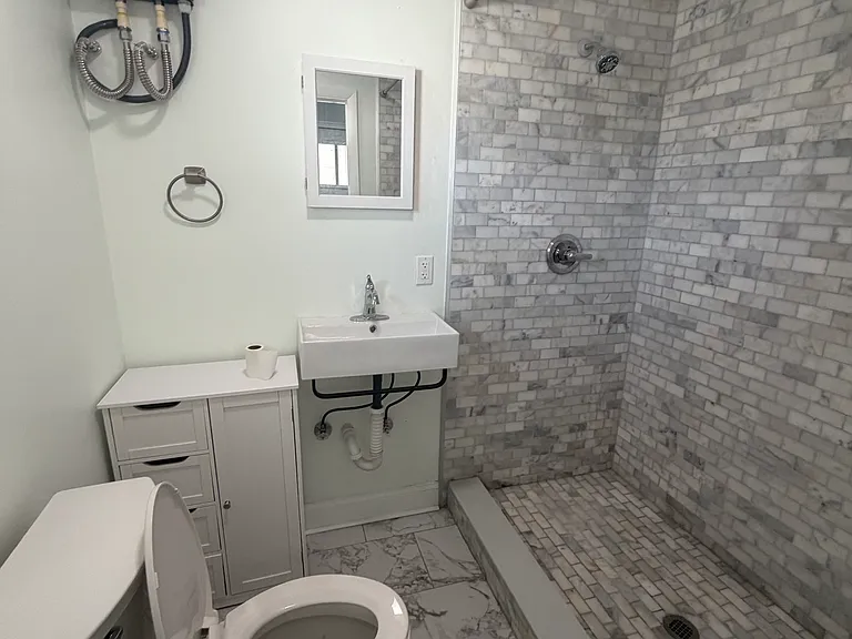 Bathroom with shower only.