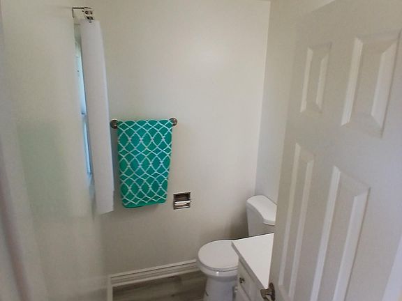 To the left of entry is your 1-2 downstairs bathroom