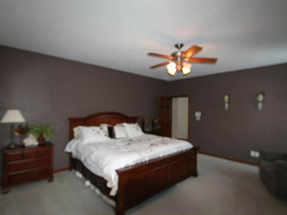 Master suite with his/her closets