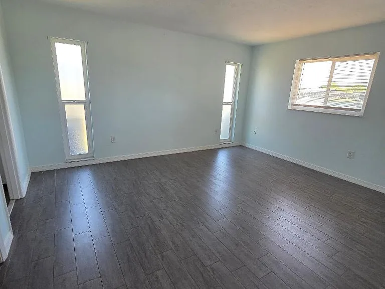 Master Suite with walk in closet and private bath with double sink and shower