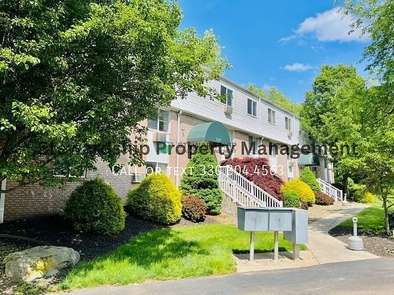 Village Woods Apartments — Photo 1