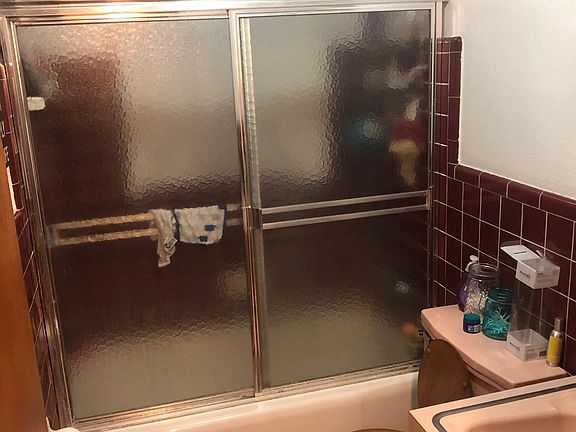 Bathroom From Hall to Back Yard Window View