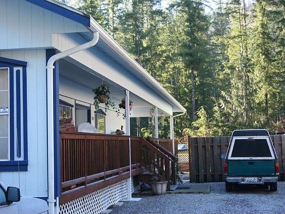 Deck covers 3 sides of house