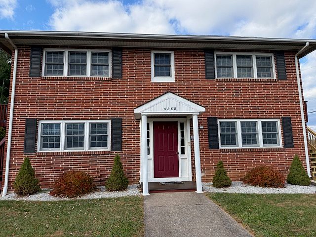 5265 E. Trindle Road Building- 4 Apartments total. Parking lot 2 spaces per unit.
