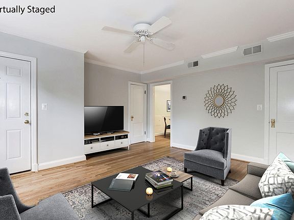 Entry into Living Room with 2 extra closets