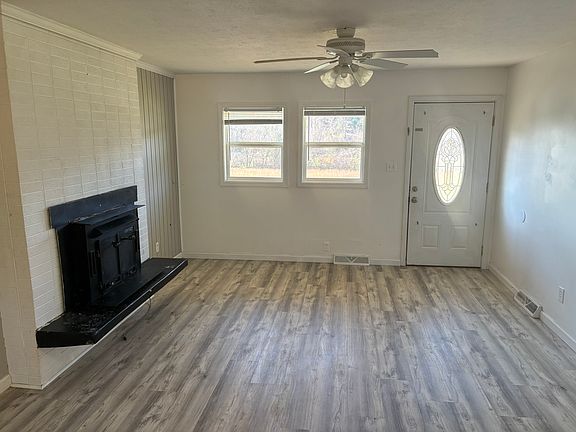 Spacious living room with lots of natural light.