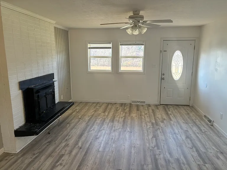Spacious living room with lots of natural light.
