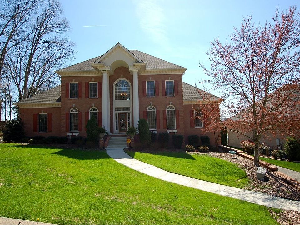 Gorgeous home on Country Hills Golf Course with views of the course and lake