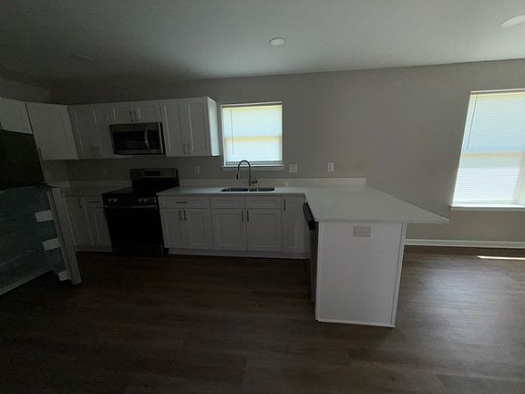 5th image of 6097 E Adams St
