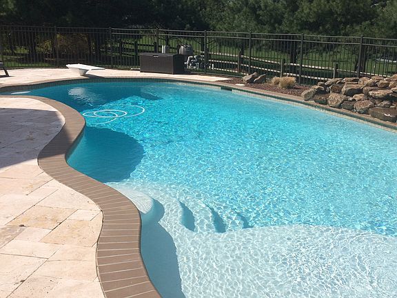 sundeck and waterfall