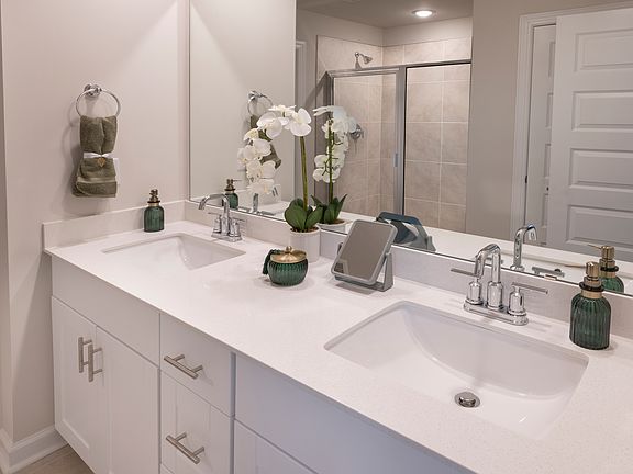 The Lennon floorplan modeled at Village at White Pine.