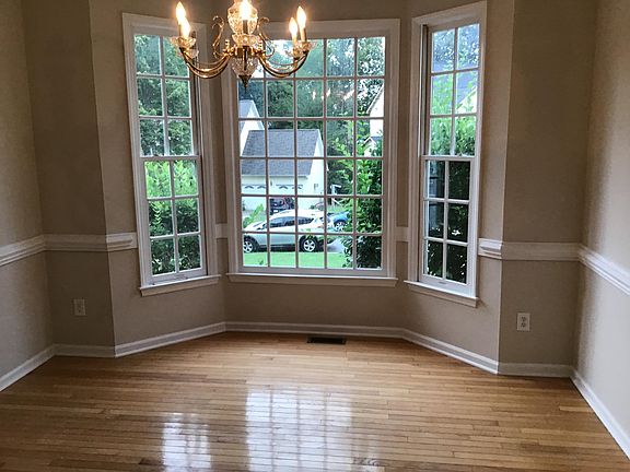 Dining room w/ bay window.
