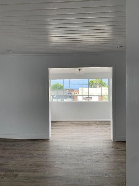 Main living area in fore-ground and dinning area beyond