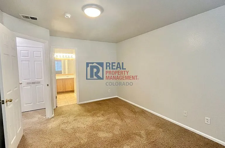 10784 W 63rd Pl #103 — Photo 16