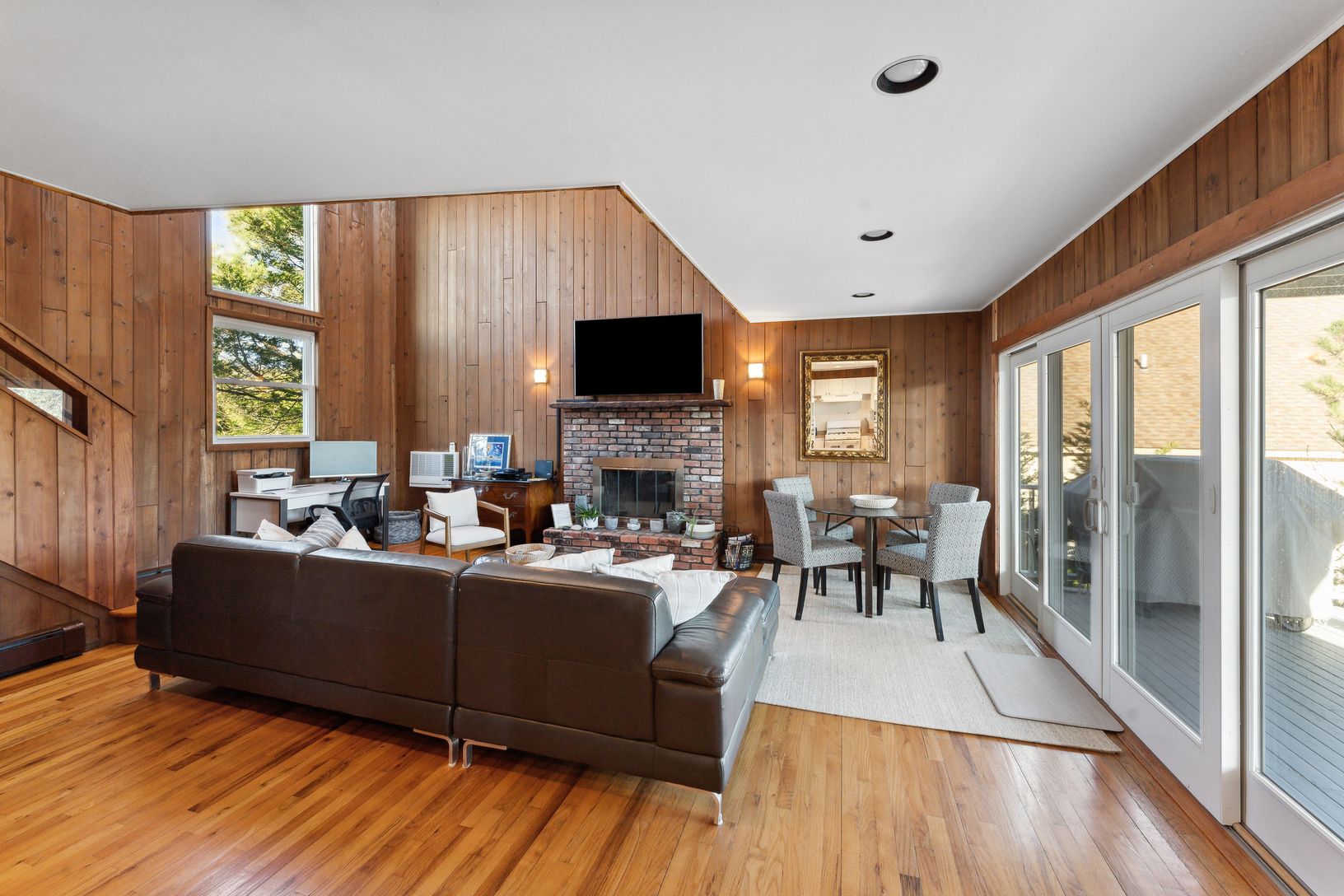 living room opens to deck