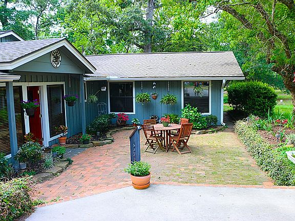 The small courtyard greets you as you first approach the front entryway, and sets the tone for the c