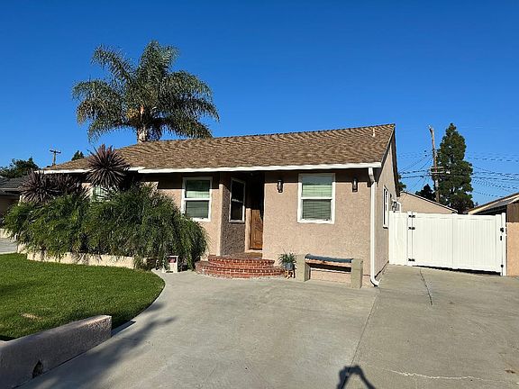 Front of house with privacy gate