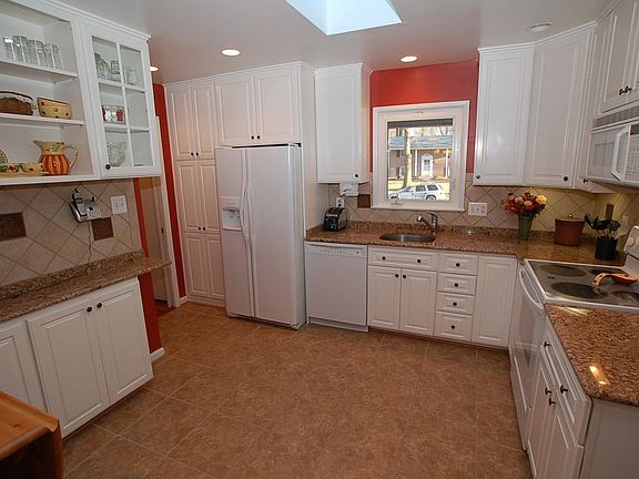 Remodeled Kitchen with 42" cabinets, granite counters, and DuraCeramic floors.