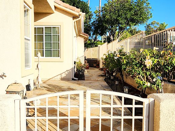 Courtyard Walkway to Front Door and Outdoor Living Area