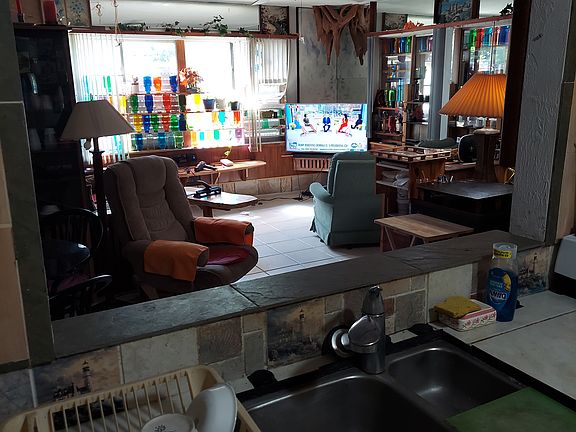 Kitchen pass-thru views Living Rm