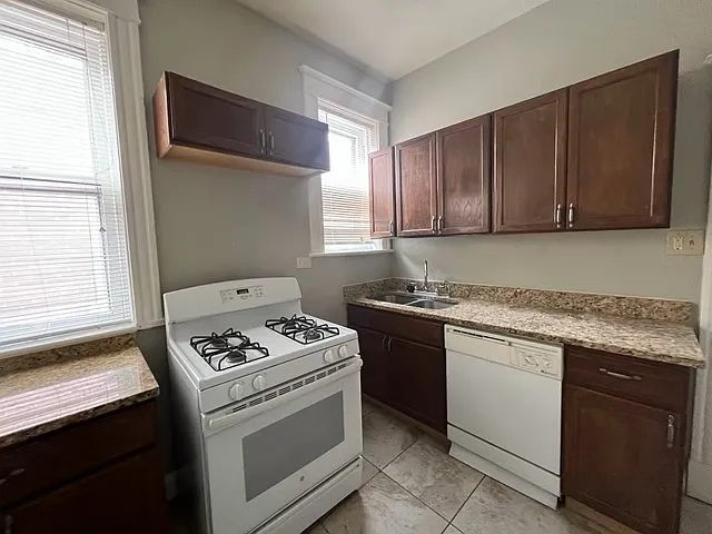 6009 Waterman Blvd — Photo 9