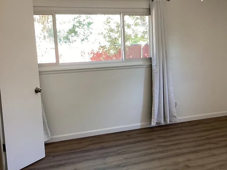Main bedroom with walk in closet and bathroom.