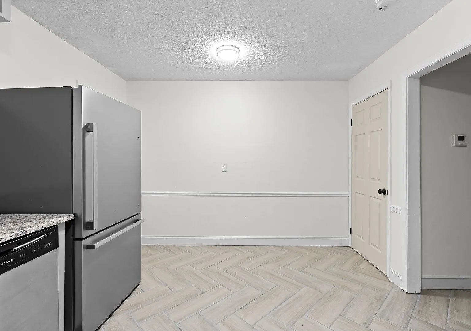 Updated Two-Bedroom Condo with New Kitchen Appliances and Private Patio — Photo 4