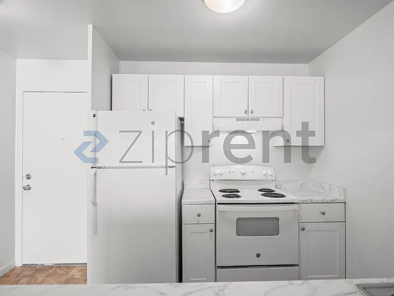 100 Village Dr #202 — Photo 12