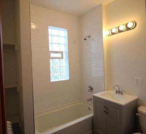 Brand new! Modern updated bathroom with built in shelving
