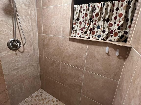 Walk in tiled shower