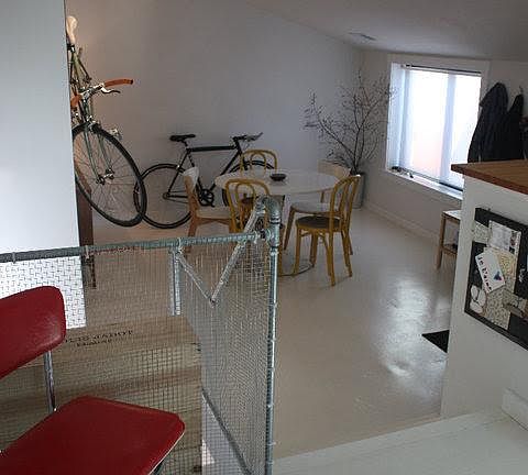 Kitchen into living room. New railing being installed soon.