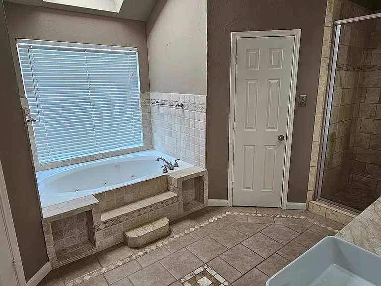 Master bath has dual sinks, separate shower from the garden tub. 2 walk in closets