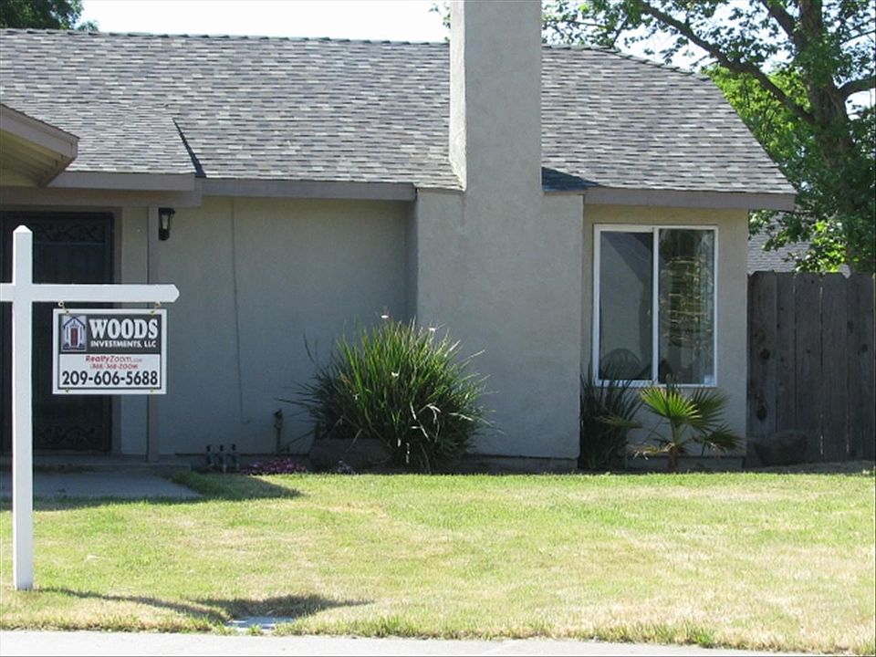 Close up view of the front of the home. Beautiful landscaping