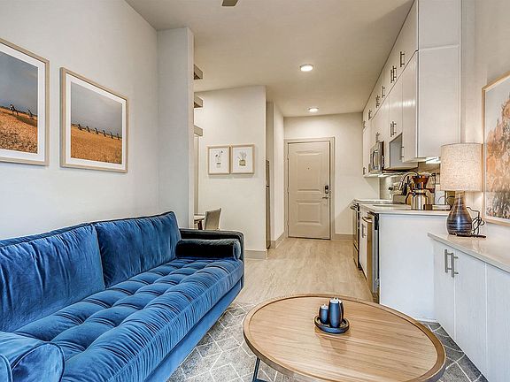 Designer-Furnished Apartment Suites Include a 55" Flatscreen Smart TV with Complimentary WiFi