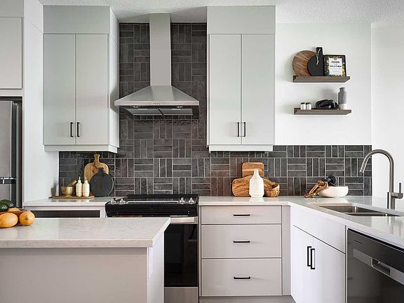 A photo of the kitchen in the Alameda show home in Crown Park by Brookfield Residential