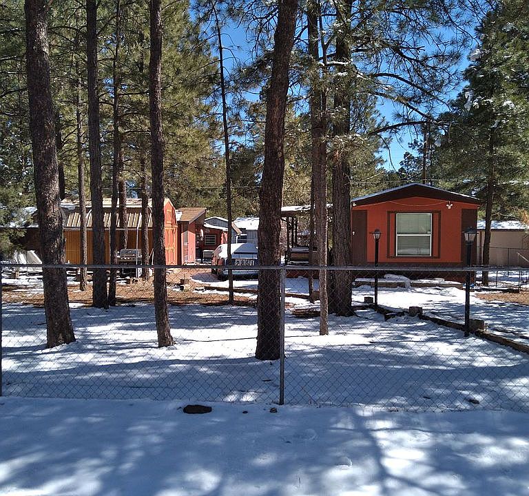 Front, near gate entry