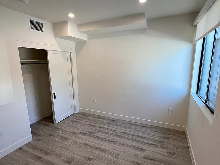 Bedrooms with windows and double closets