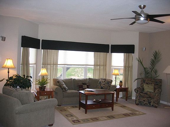 View of family room w/ 9' ceilings and bay window