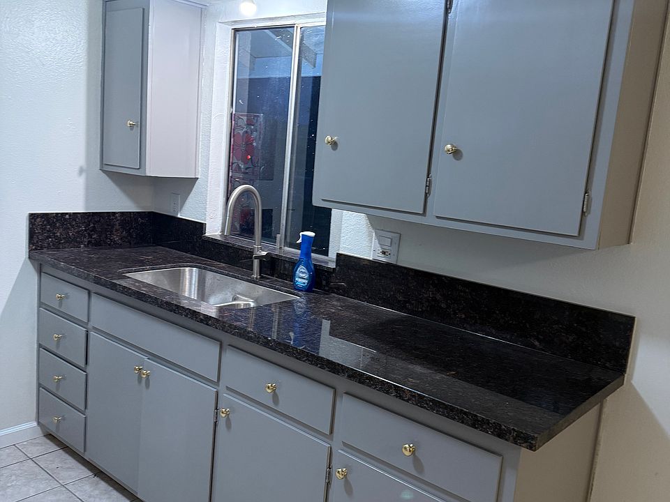 Kitchen sink , cabinets and countertop