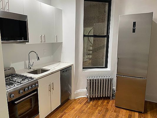 2nd image of 233 E 3rd St #1