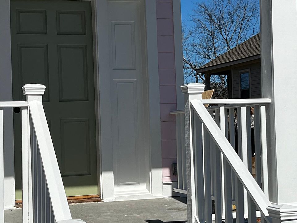 Your front porch and fan with enough room for a few chairs to sit and watch the neighbors.